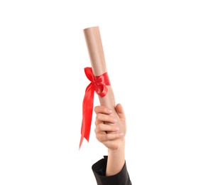 Student holding rolled diploma with red ribbon on white background, closeup