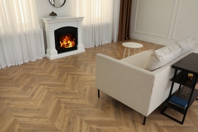 Modern living room with parquet flooring and fireplace