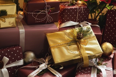 Photo of Pile of different Christmas gifts as background