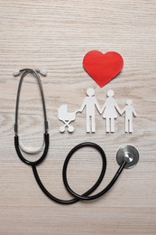 Photo of Paper family cutout, red heart and stethoscope on white wooden background, flat lay. Insurance concept