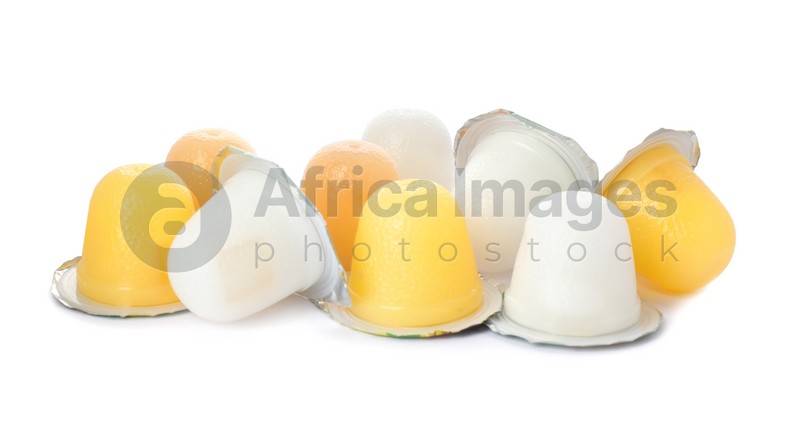 Tasty bright jelly cups on white background