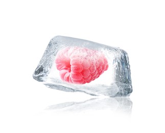 Delicious raspberry frozen in ice isolated on white 