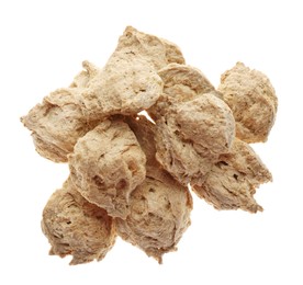 Dehydrated soy meat chunks on white background, top view
