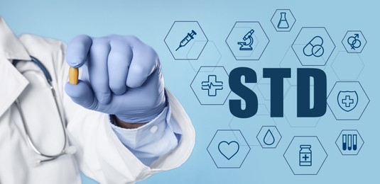 STD prevention. Closeup view of doctor with suppository , abbreviation and different icons on light blue background, banner design