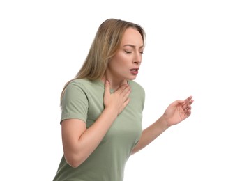 Young woman suffering from pain during breathing on white background