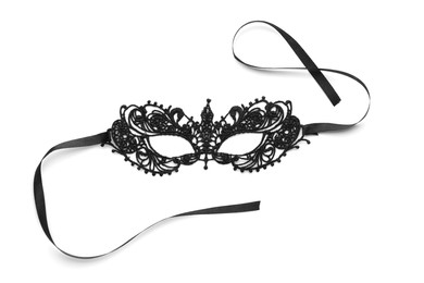 Black lace mask on white background, top view. Accessory for sexual roleplay
