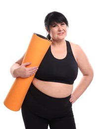 Photo of Happy overweight mature woman with yoga mat on white background