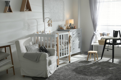Baby room interior with crib and highchair. Idea for design