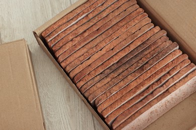 Box with decorative bricks on floor. Tiles installation process