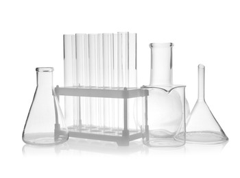 Photo of Set of laboratory glassware on white background