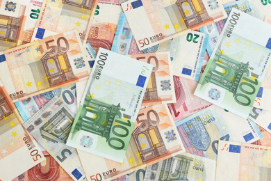 Euro banknotes as background, top view. Money and finance