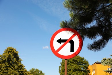 Photo of Road sign No Left Turn outdoors on sunny day. Space for text