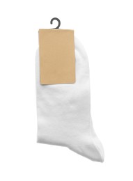 New pair of cotton socks on white background, top view