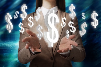 Money exchange concept. Businesswoman with dollar currency symbols on blue background, closeup