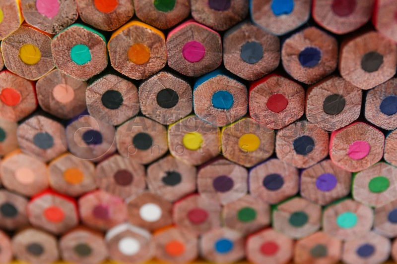 Different color pencils as background, closeup view