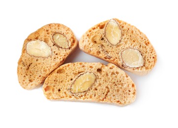 Slices of tasty cantucci on white background, top view. Traditional Italian almond biscuits