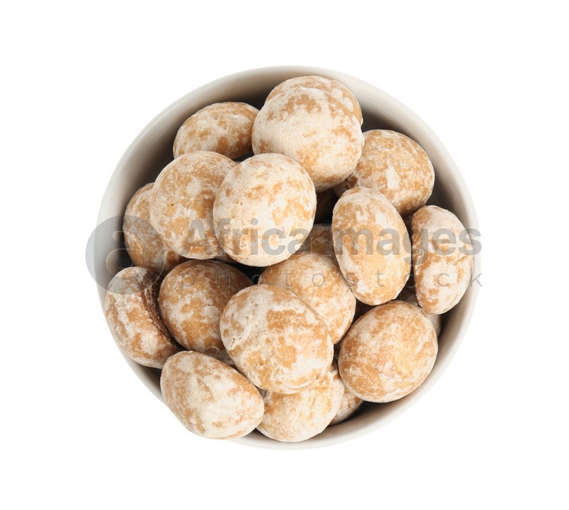 Photo of Tasty homemade gingerbread cookies in bowl on white background, top view