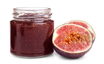 Photo of Glass jar of tasty sweet fig jam isolated on white