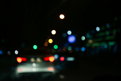 Photo of Blurred view of city at night. Bokeh effect