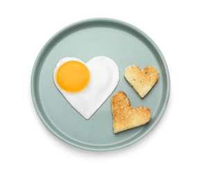 Romantic breakfast with heart shaped fried egg and toasts on white background, top view