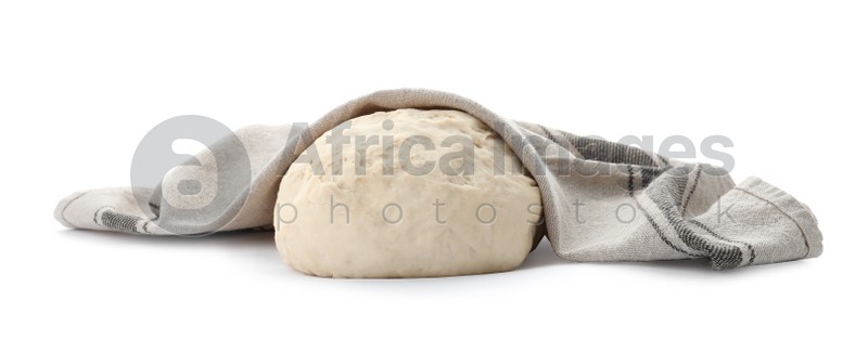 Photo of Dough for pastries covered with napkin on white background