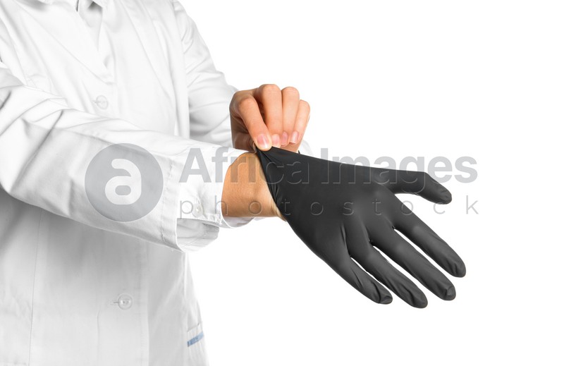 Doctor wearing medical glove on white background