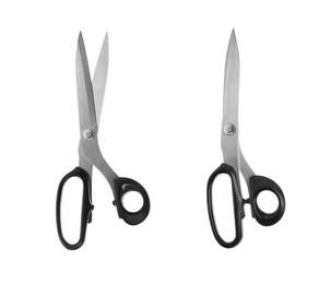 Sharp sewing scissors on white background, top view