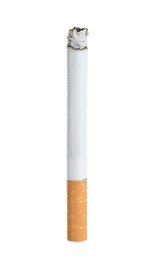 Cigarette with orange filter smoldering on white background