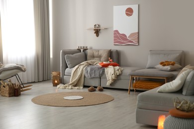 Photo of Spacious living room interior with comfortable sofa