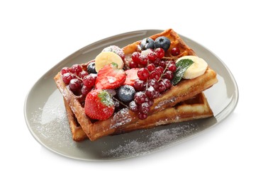 Photo of Plate of delicious Belgian waffles with berries and powdered sugar isolated on white