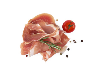 Delicious prosciutto with rosemary and tomato on white background, top view