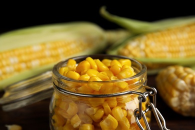Tasty sweet corn kernels in jar, closeup view