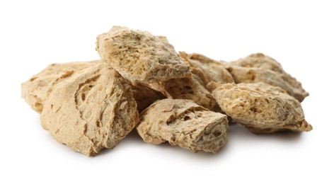 Dehydrated soy meat chunks on white background