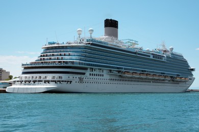 Modern cruise ship in sea on sunny day