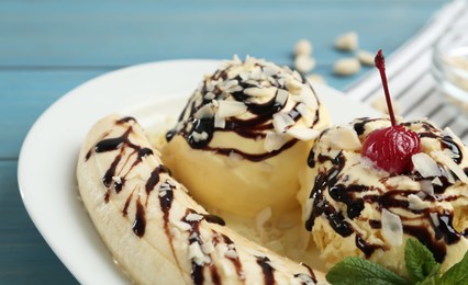Delicious dessert with banana ice cream on table, closeup