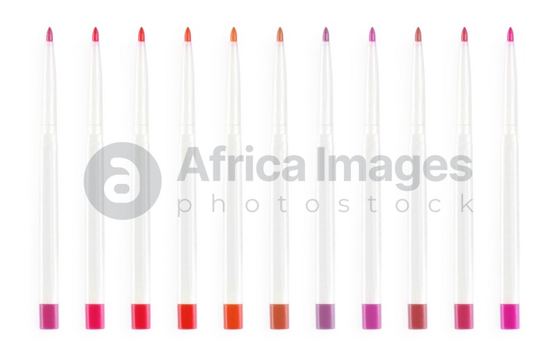 Set with lip pencils of different shades on white background. Decorative cosmetics