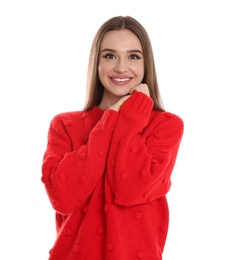 Beautiful young woman in red sweater on white background. Winter season