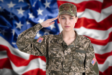 Female soldier and American flag on background. Military service