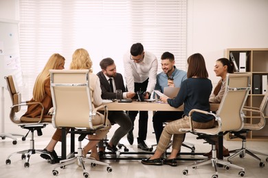 Businesspeople having meeting in office. Management consulting