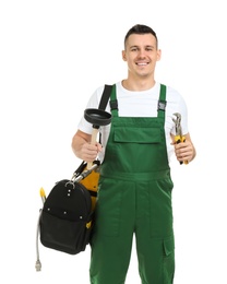 Young plumber with adjustable wrench and force cup on white background