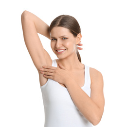 Young beautiful woman showing armpit with smooth clean skin on white background