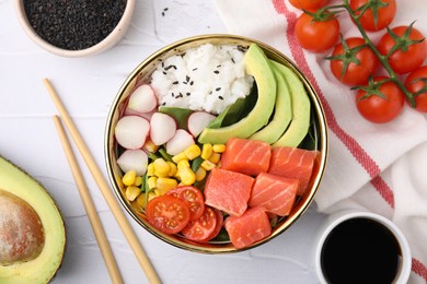 Photo of Delicious poke bowl with salmon, avocado and vegetables on white textured table, flat lay
