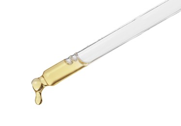 Dripping hydrophilic oil from pipette on white background