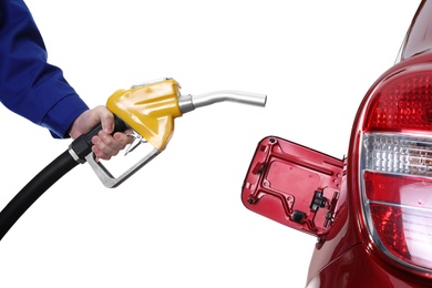 Gas station worker with fuel nozzle near car on white background, closeup