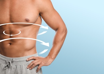 Image of Metabolism concept. Man with perfect body on light blue background, closeup