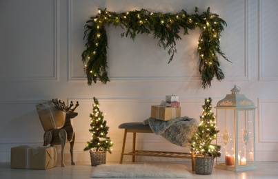 Beautiful Christmas themed photo zone with fir decor