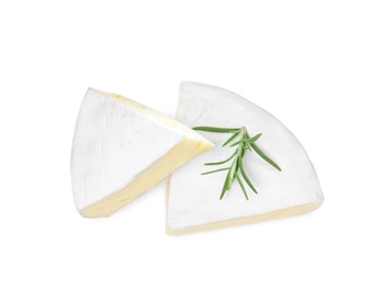 Tasty cut brie cheese with rosemary on white background, top view