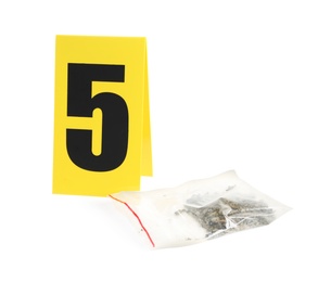 Plastic bag with cannabis and crime scene marker with number five isolated on white