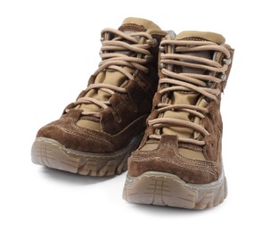 Photo of Pair of comfortable hiking boots on white background. Camping tourism