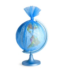 Globe in plastic bag isolated on white. Environmental conservation